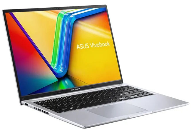 Bon Plan : plusieurs PC portables à prix réduits | Bhmag Open silver ASUS Vivobook laptop showing colorful screen with logo on display. Bon Plan : plusieurs PC portables à prix réduits