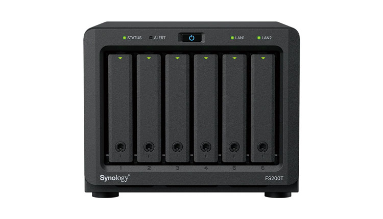Eight-bay Synology NAS (FS200T) front panel with drive bays, power switch, and status LEDs showing activity and LAN indicators.